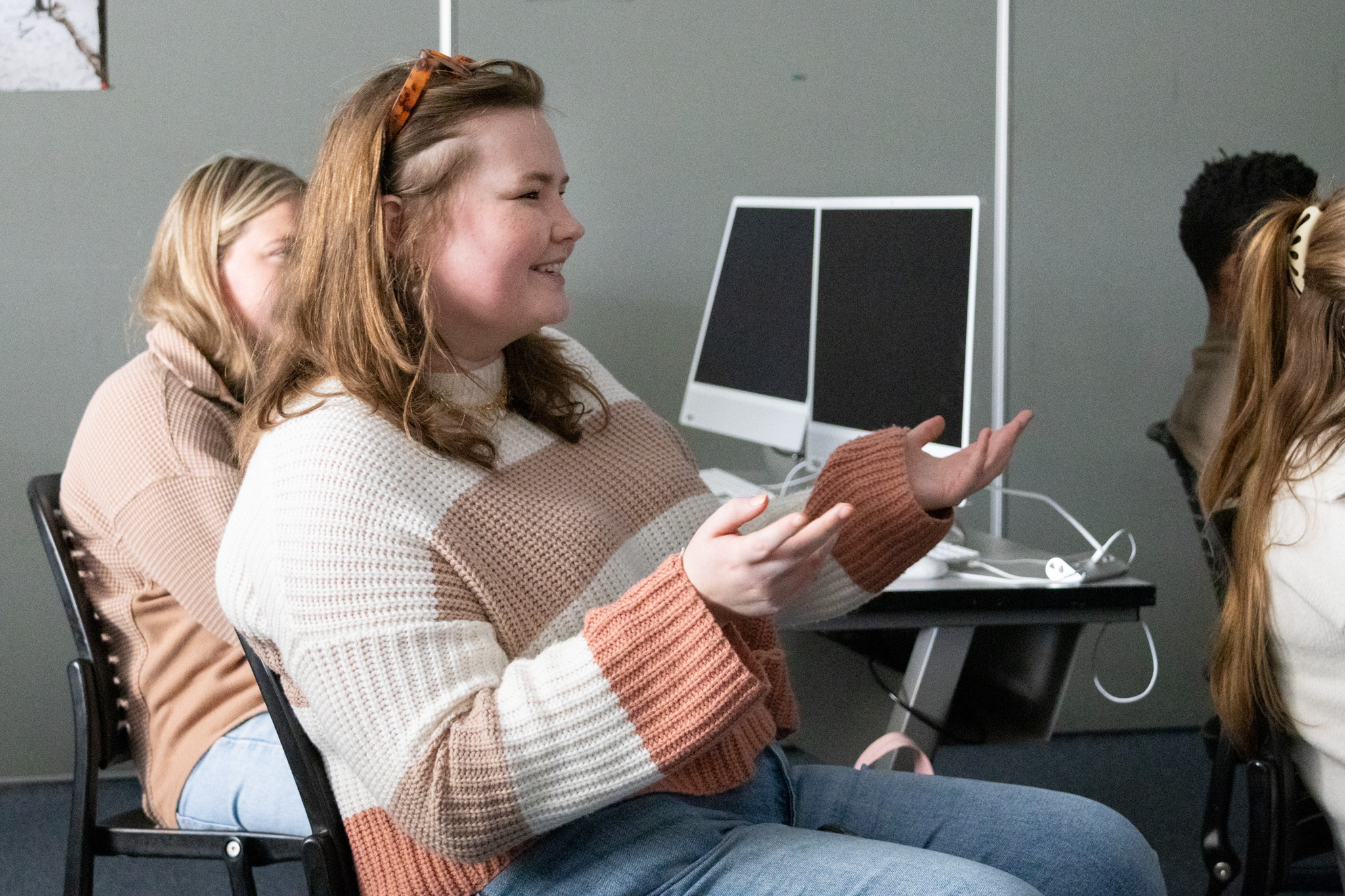 ETSU CBAT master’s student Flannery Newman asks a question during John Godsey and Anthony “Chusy” Haney-Jardine's presentation.