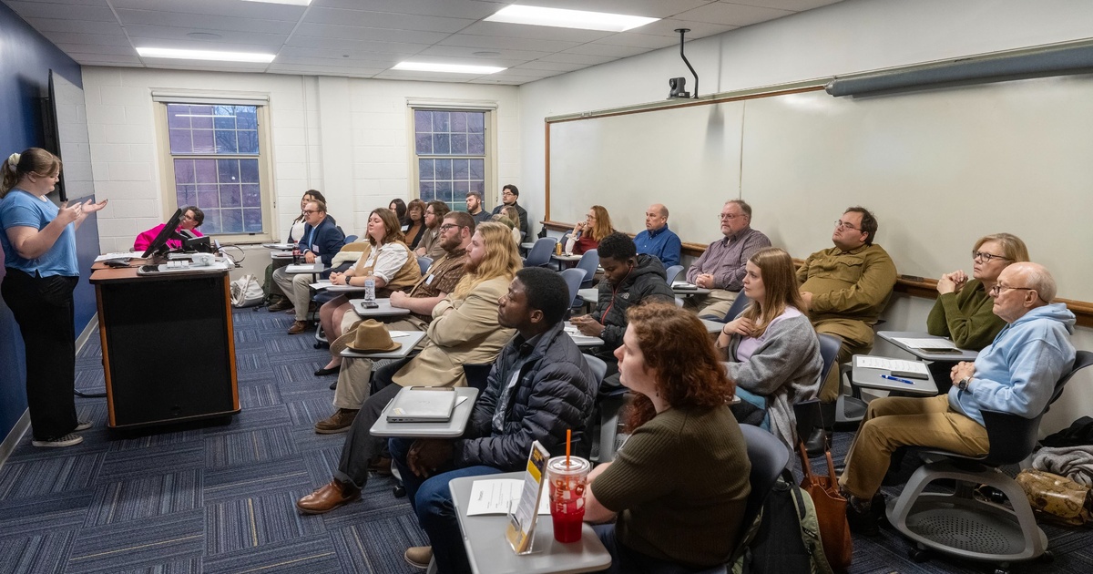 A room is packed with listeners during the 2025 History Graduate Research Conference.