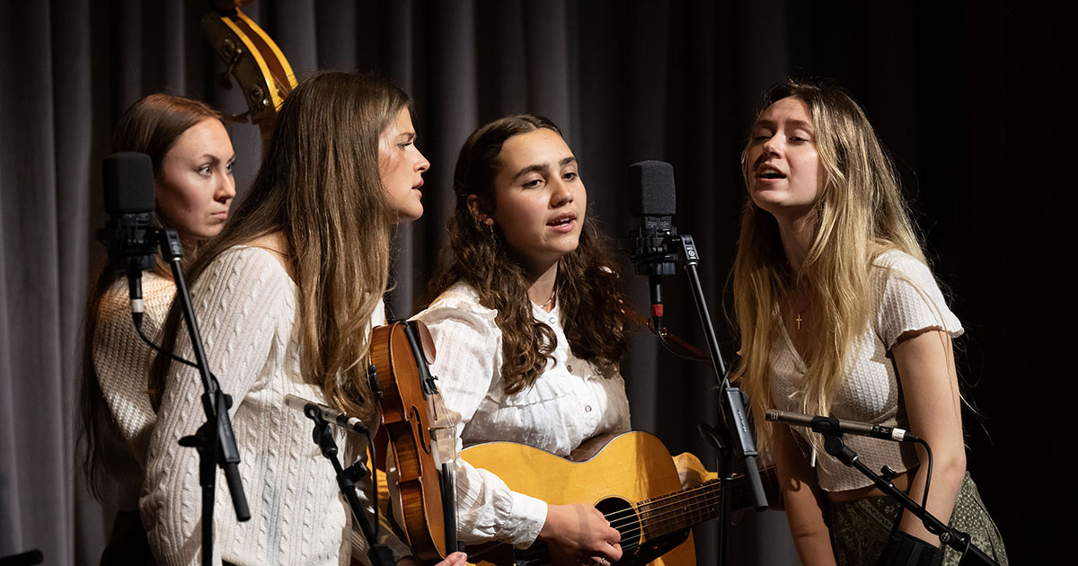 Student musicians perform a vocal and acoustic set on stage during the ETSU Mary B. Martin School of the Arts Showcase.