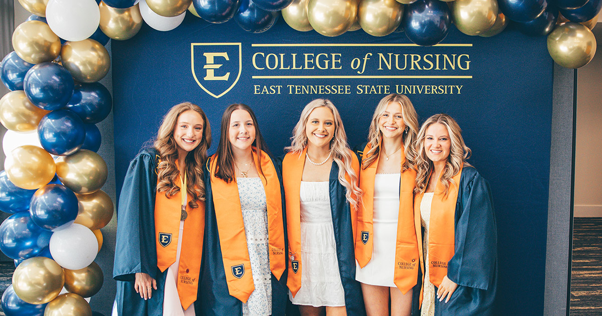 Graduates from the Spring 2026 Class of ETSU's College of Nursing pose for photos