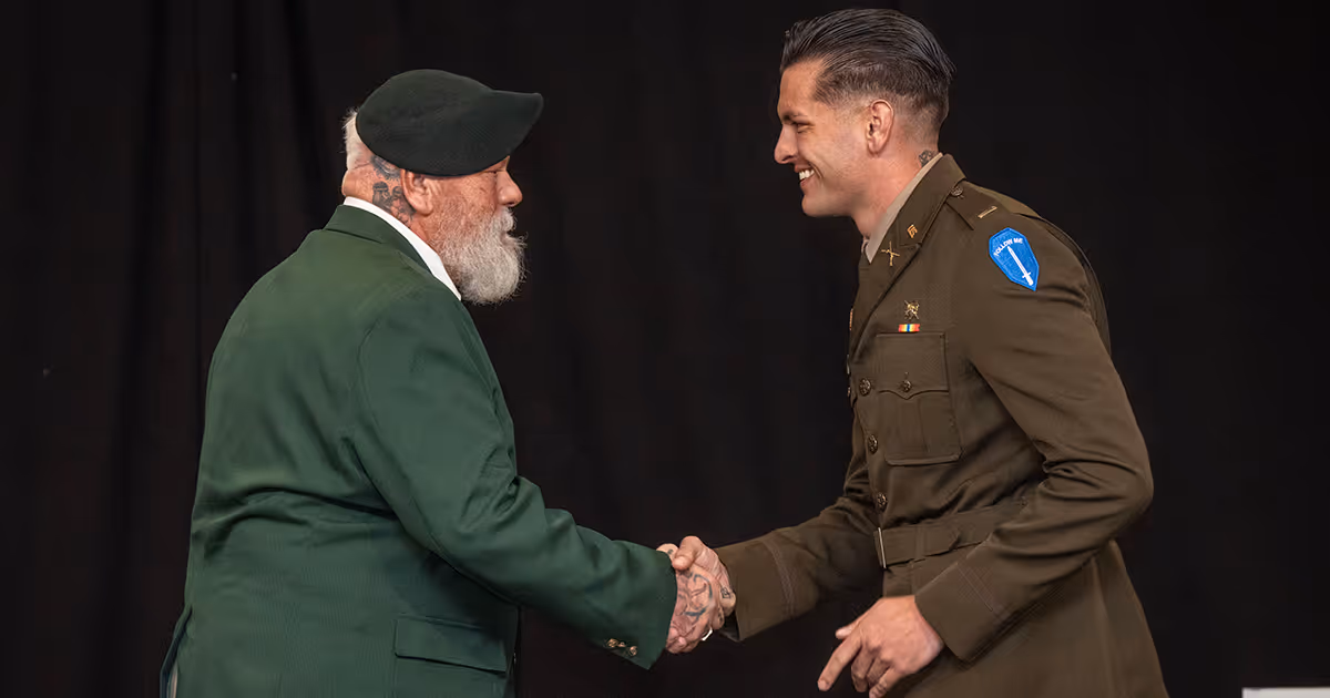 An ROTC cadet receives his officer commission