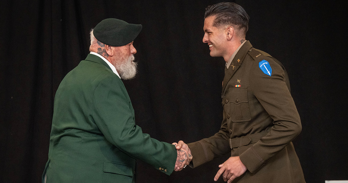 An ROTC cadet receives his officer commission