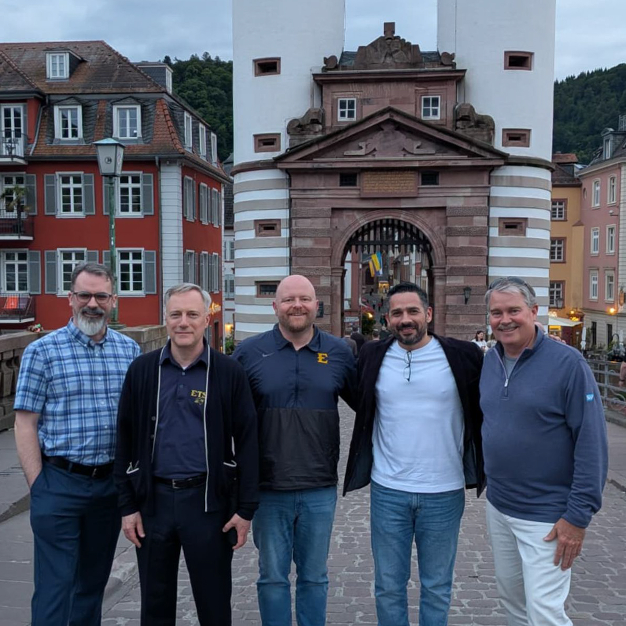 Four ETSU computing faculty and a guest smile and pose together in Germany.