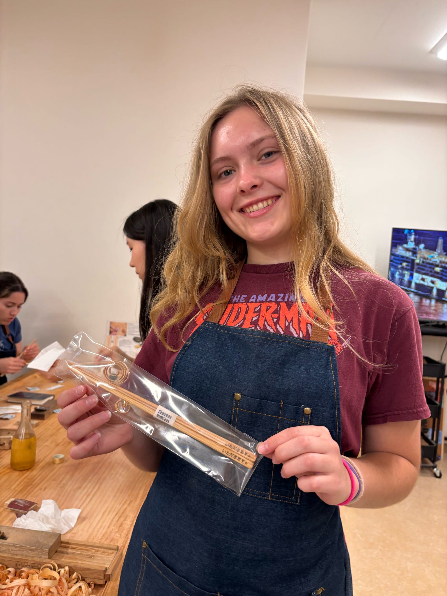 An ETSU student smiles during the Japan trip after a facility tour.