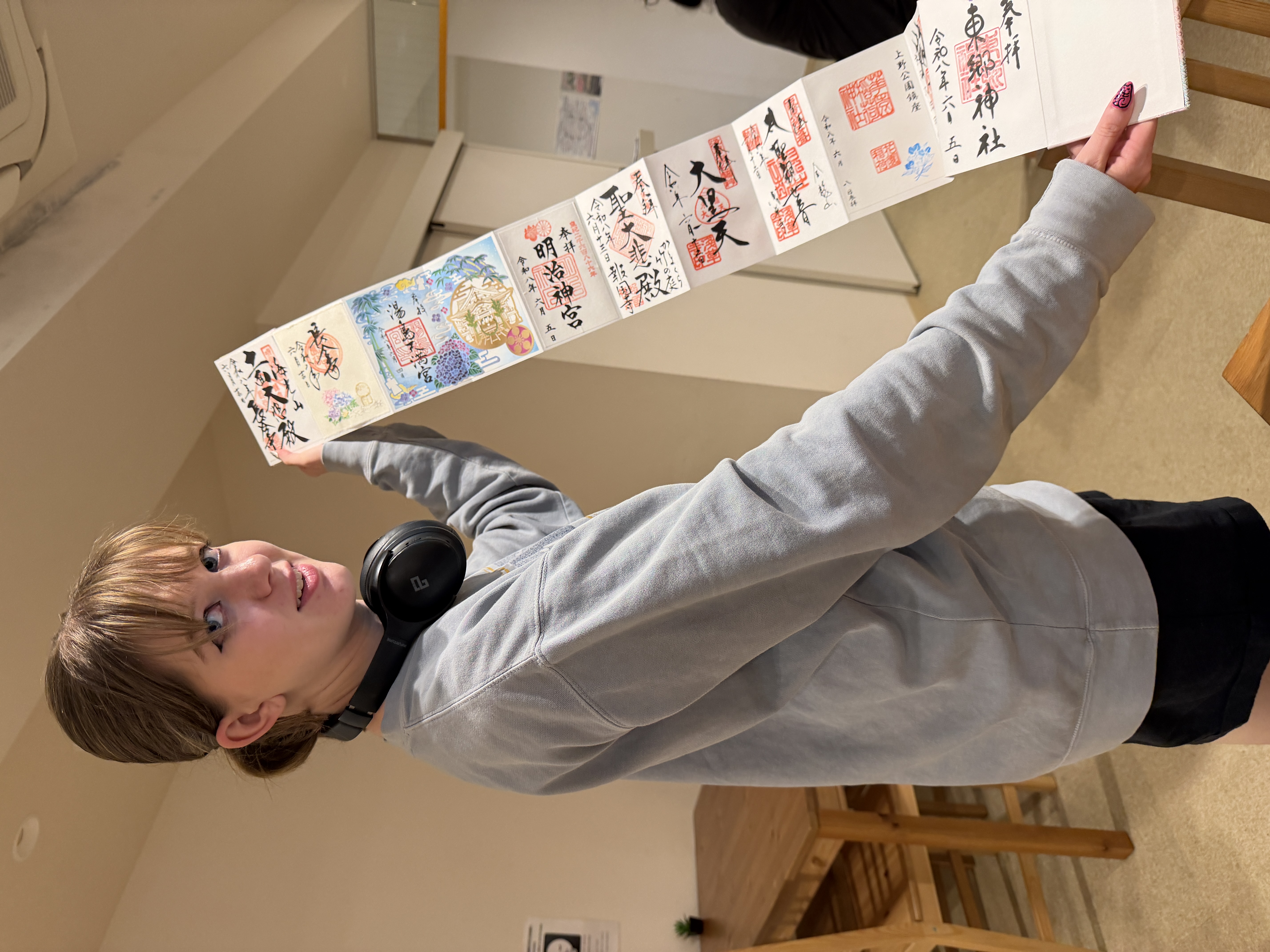 An ETSU student shows off some artwork during the Japan trip.