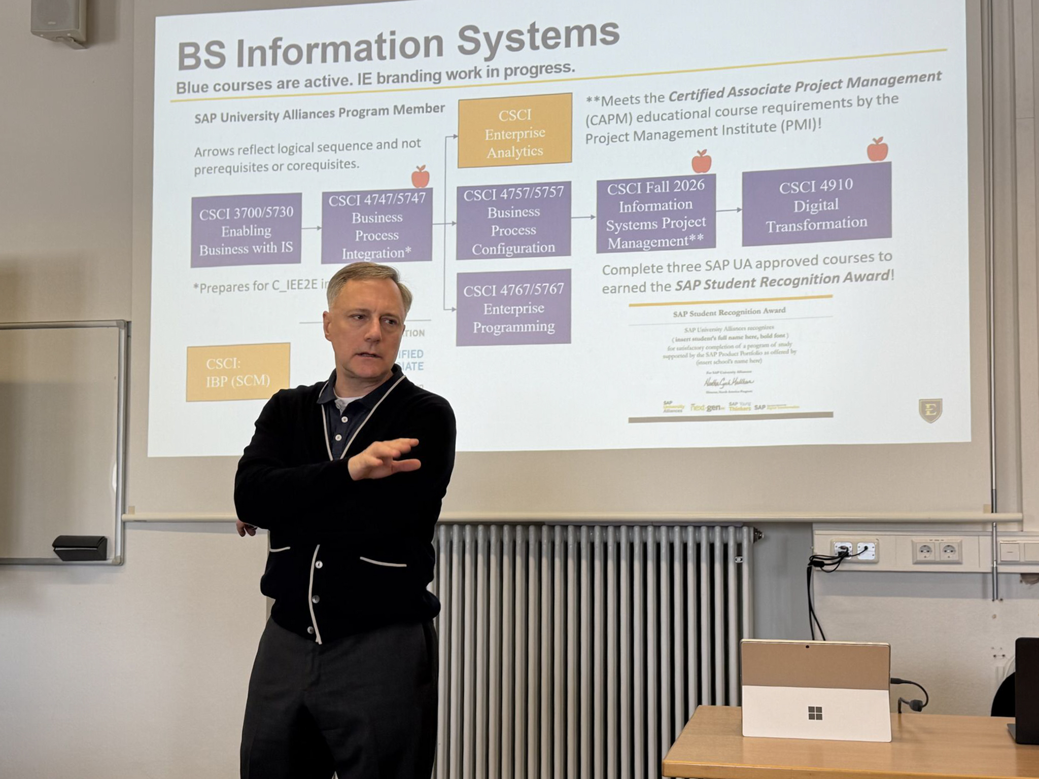 ETSU associate professor in computing Douglas Battleson gives a presentation while in Germany.