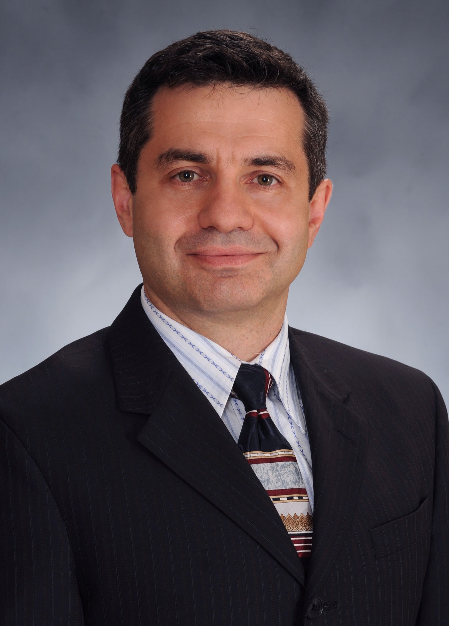 A headshot photograph of Dr. Valentin Yakubenko