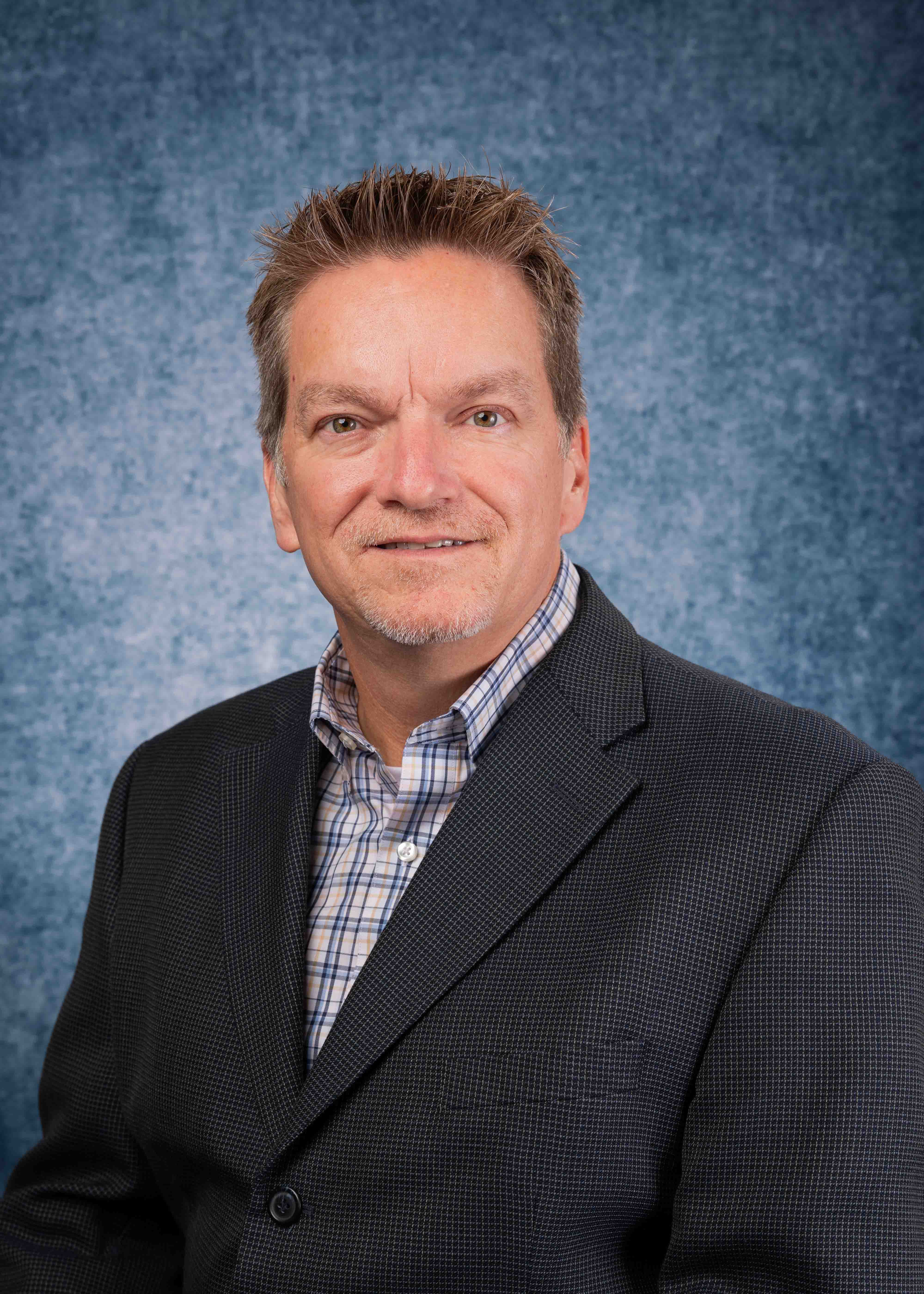 A headshot photograph of Dr. Rick Hess