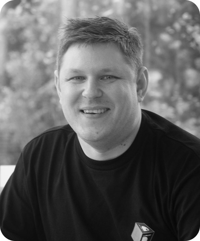 Black and white head and shoulders image of Matt Houghton