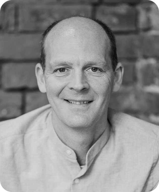 Black and white headshot of Dave Anderson