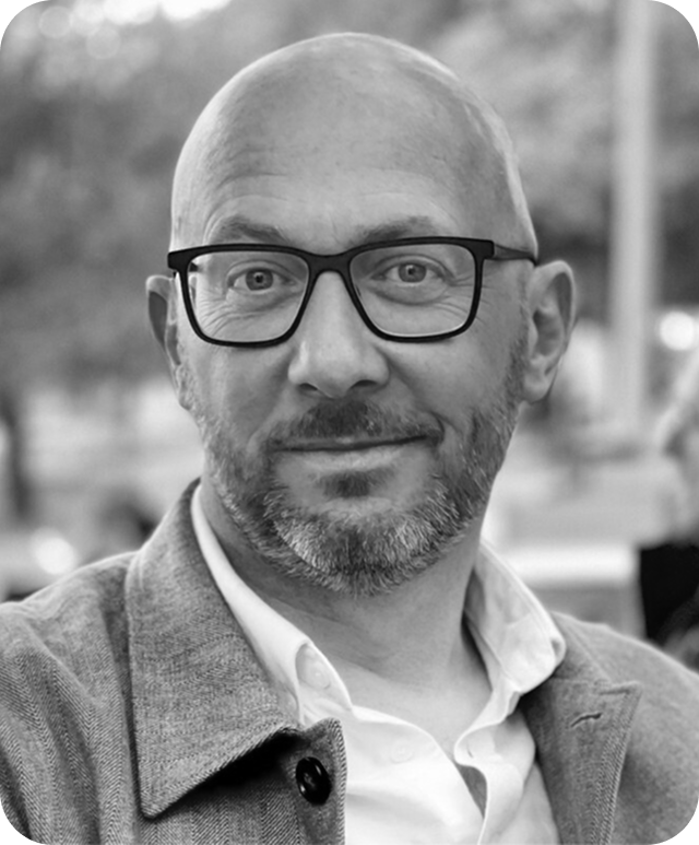 Black and white headshot of Rick Houghton