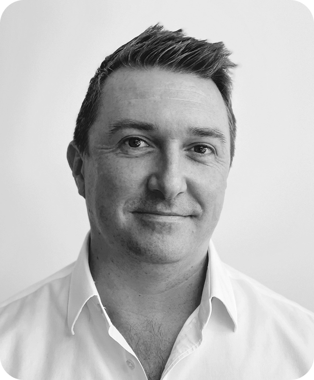 Black and white picture of Clint McKellar, Director of AWS at CGI UK