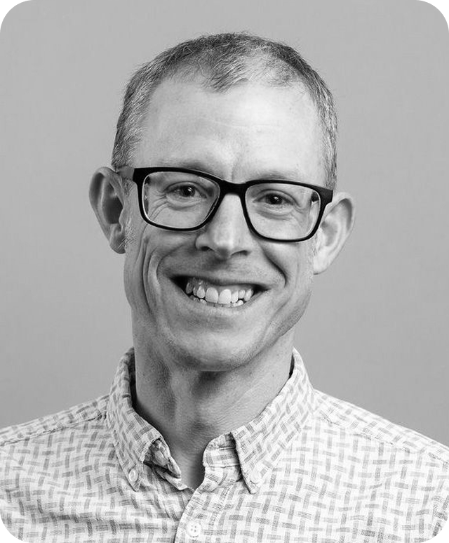 Black and white headshot of Colin Eberhardt, CTO at ScottLogic