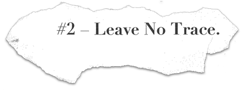 Torn paper with the text 'Rule #2 – Leave No Trace.'