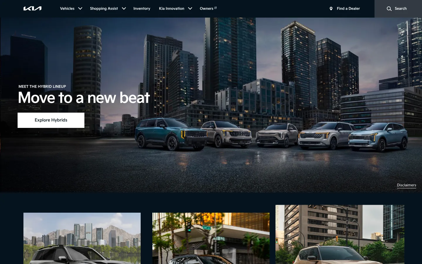 Kia America website homepage — the new Kia logo above “Move to a new beat” and a lineup of hybrid SUVs