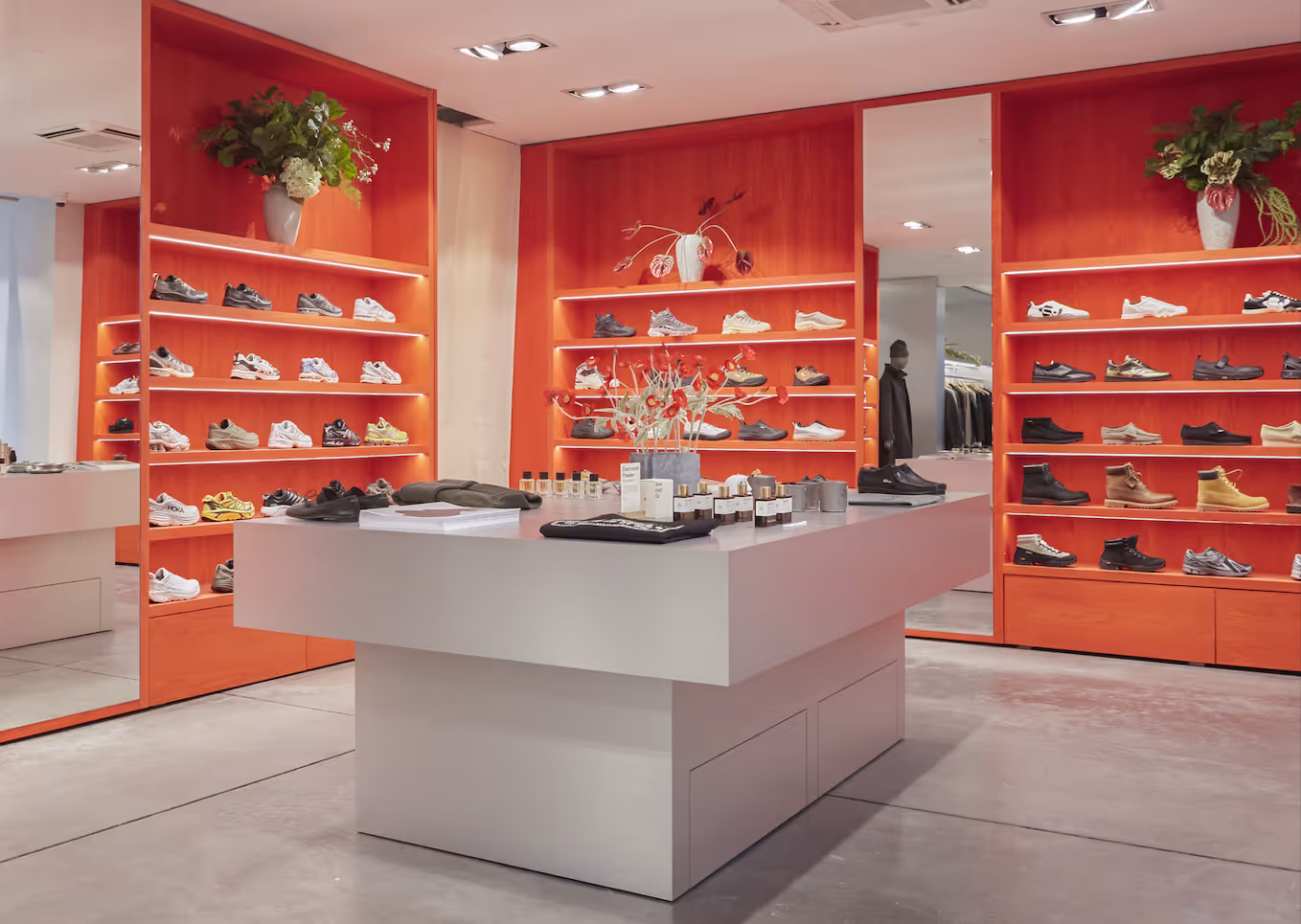 Image of the rezet house store, a read wall with shoes