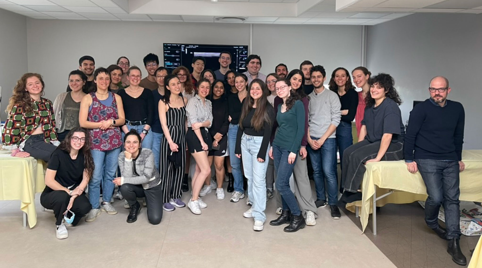 A doctor examining a patient’s arm in a clinical setting, providing medical care and consultation.
