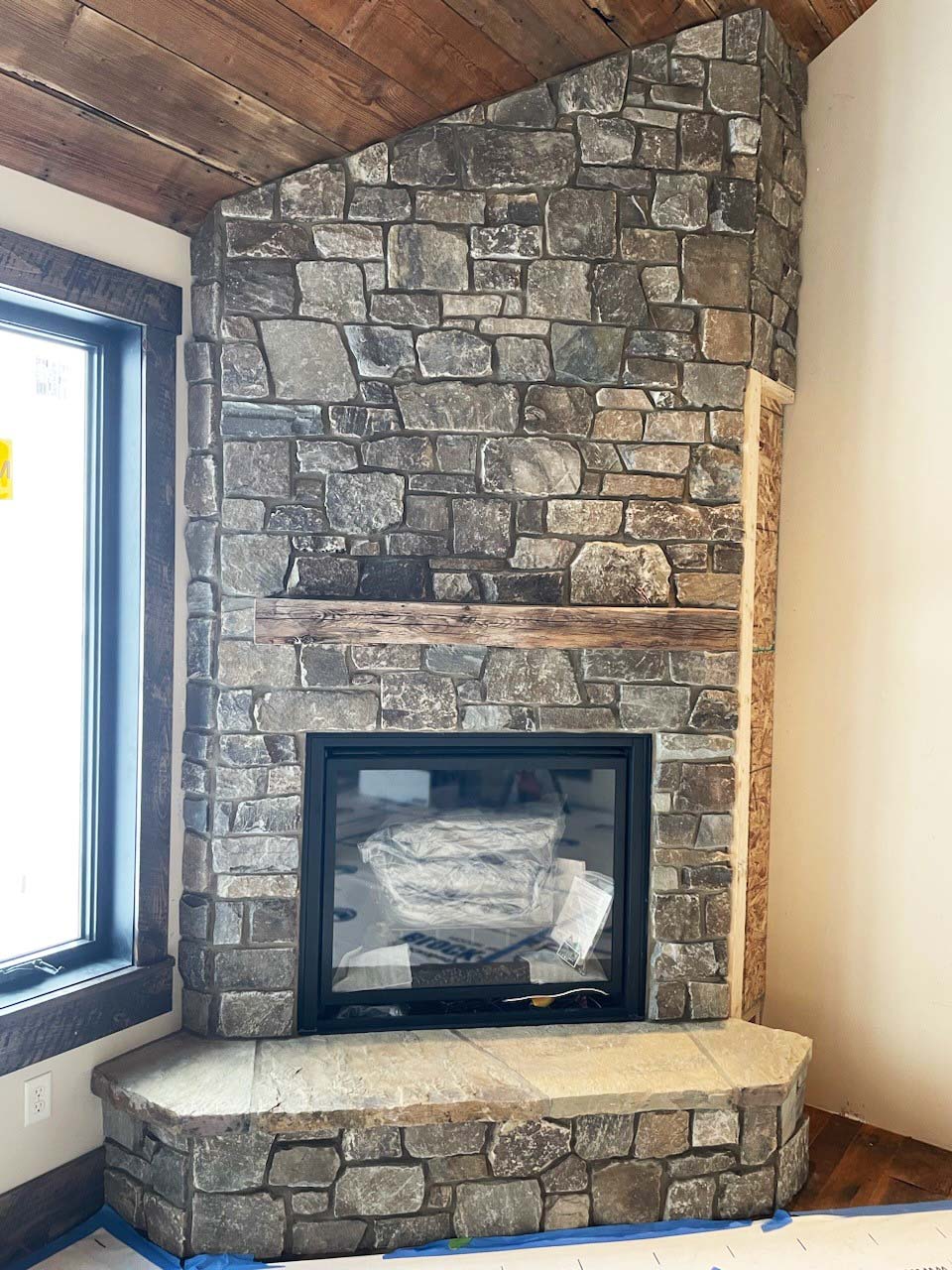 rustic oaks stone fireplace