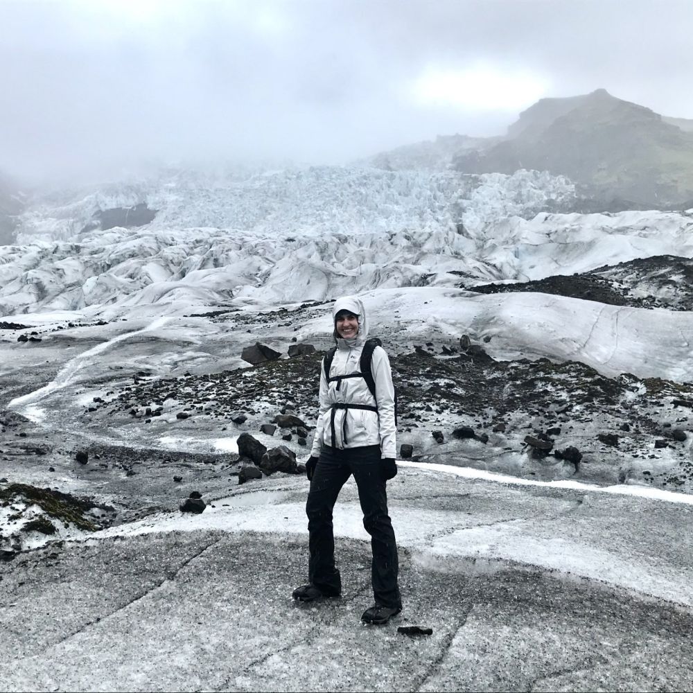 Kirsten standing on an Icelandic glacier 