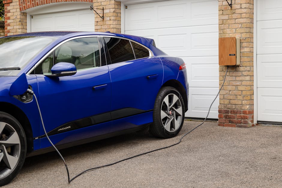 Tesla charging in modern Plano garage - tesla charger install plano