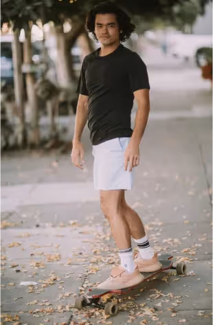 Man riding a longboard