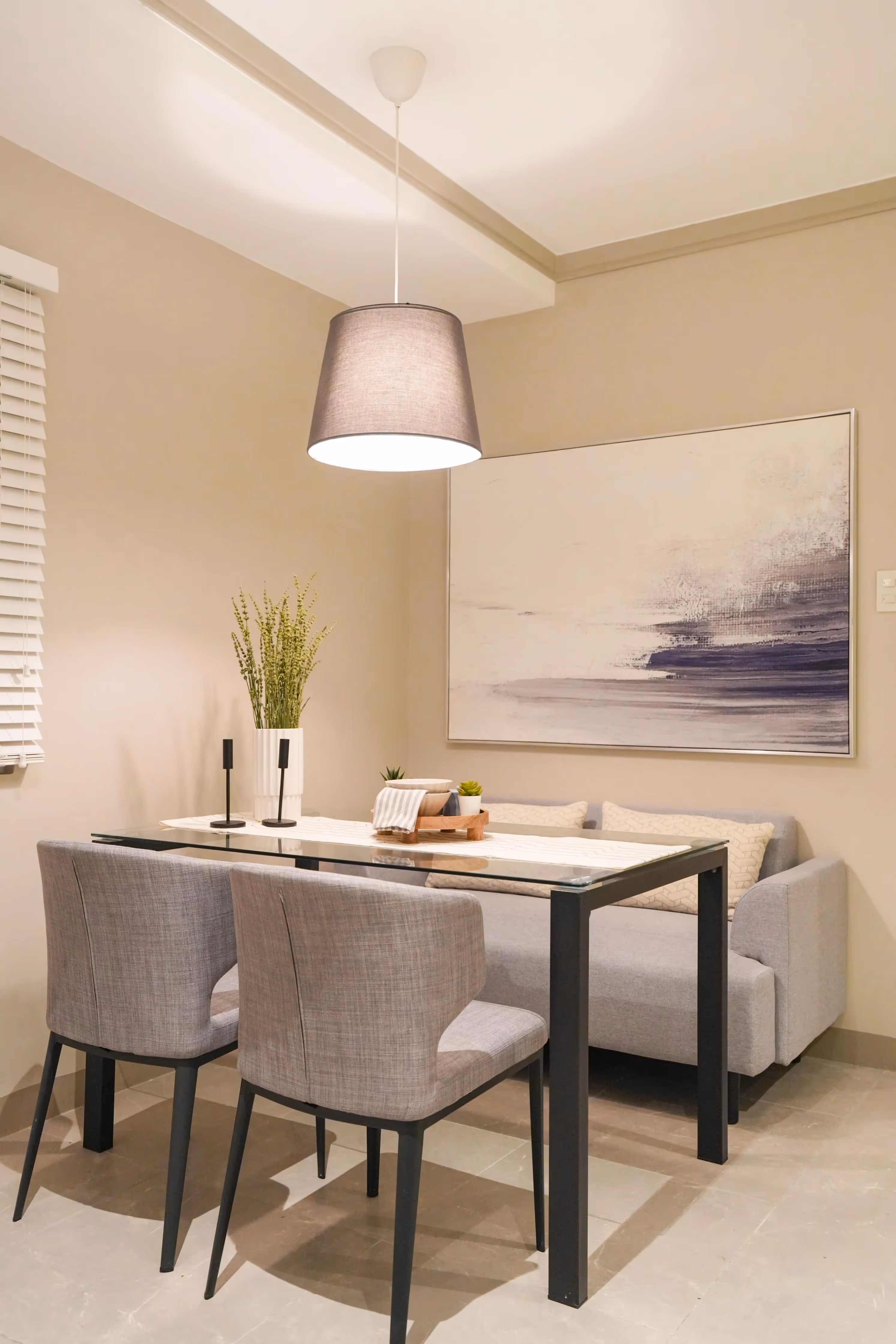 Tall modern building towering over a city skyline.