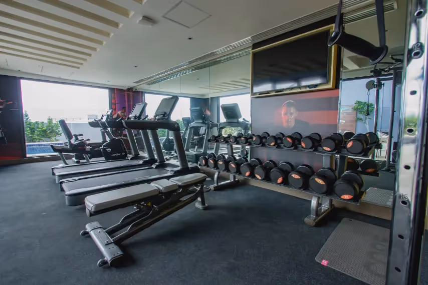 Fully equipped gym with strength and cardio machines at Dusit Thani Residence Davao.