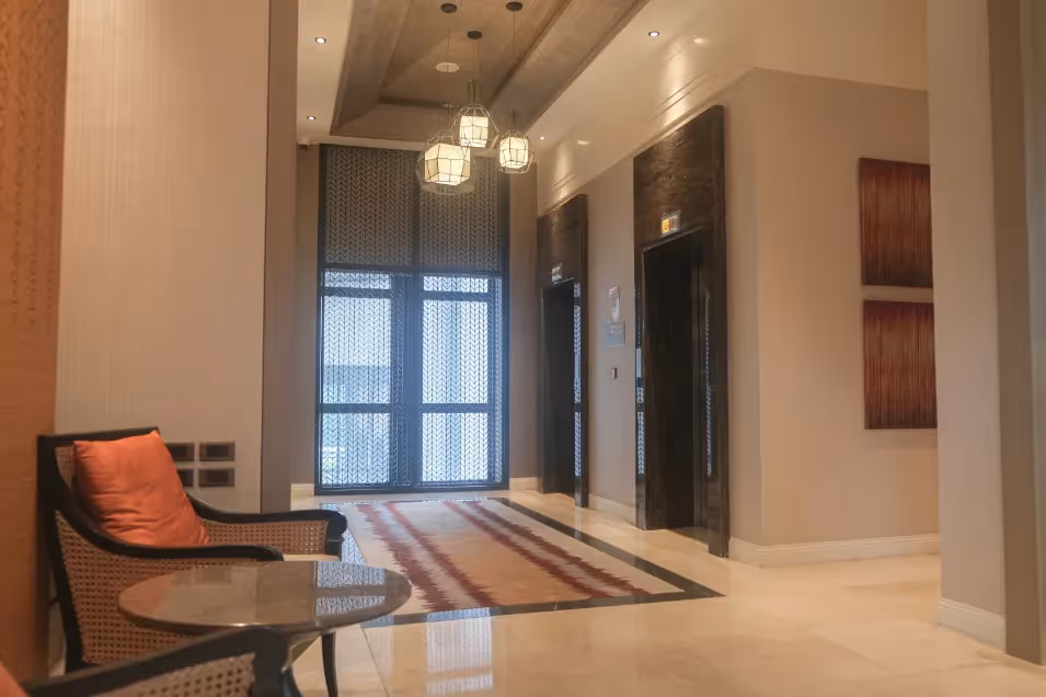 Contemporary lobby space with warm lighting and upscale furnishings at Dusit Thani Residence Davao.