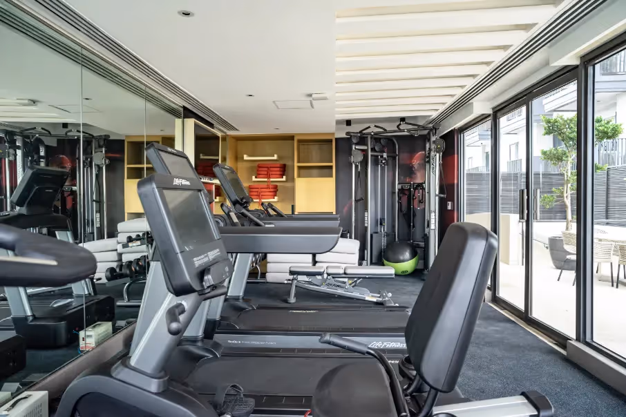 Fully equipped fitness center with cardio machines at Dusit Thani Residence Davao.