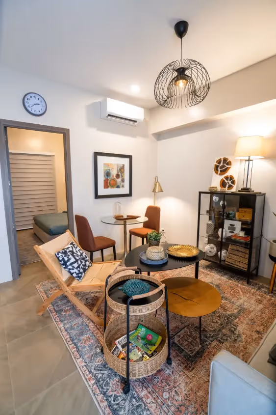 Bright one-bedroom unit showcasing a modern open-concept living and dining space at Merano, Tierra Lorenzo Lipa.