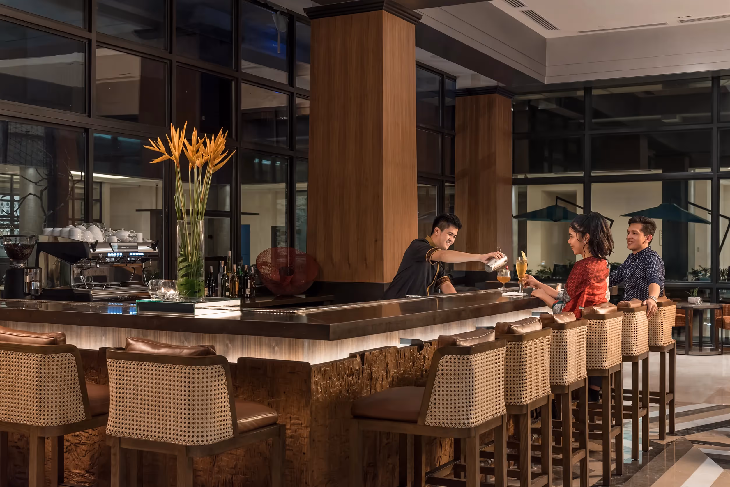 Relaxing lounge area with comfortable seating and natural lighting at dusitD2 Davao.