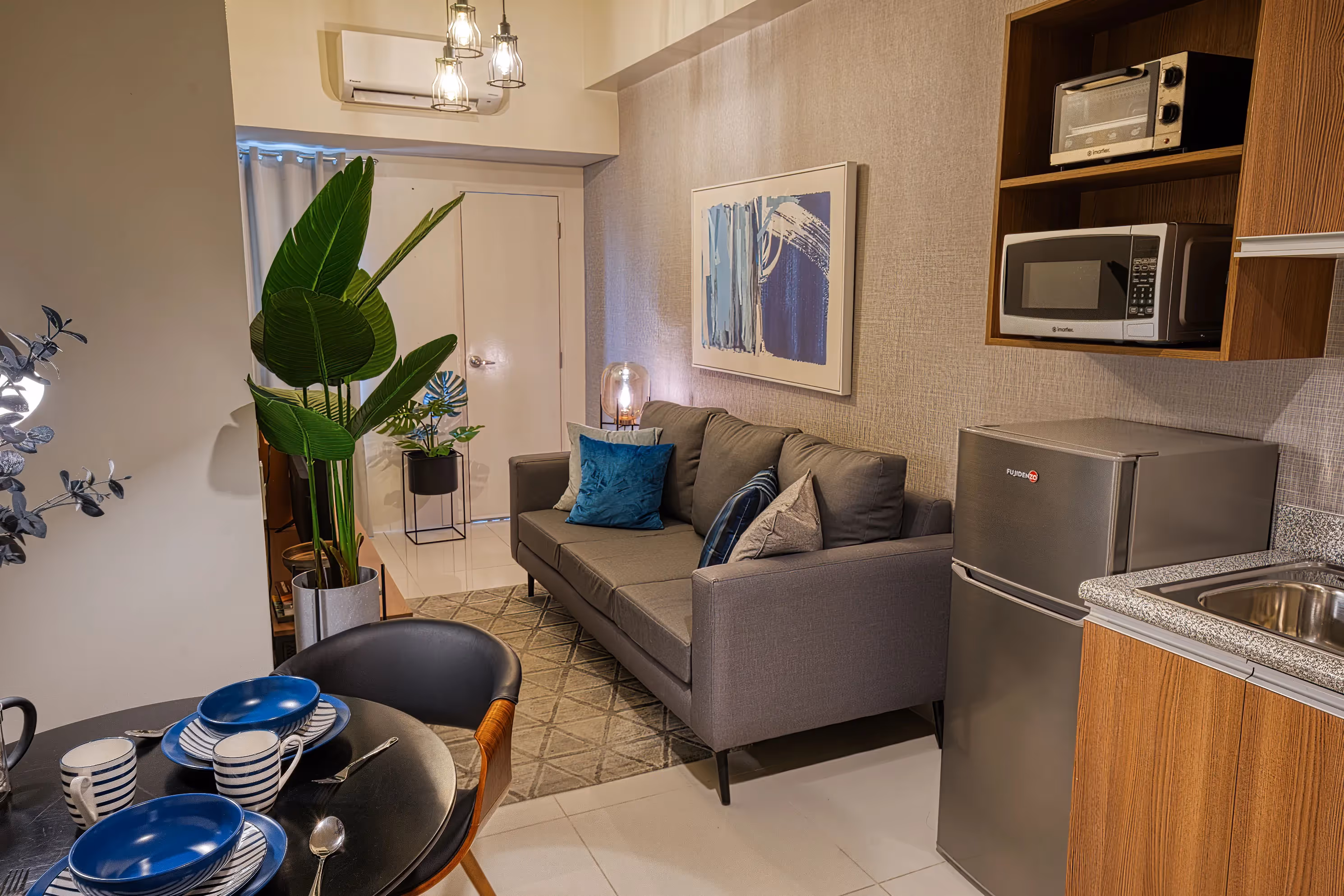 Living area with modern furnishings and open layout at 3Torre Lorenzo.