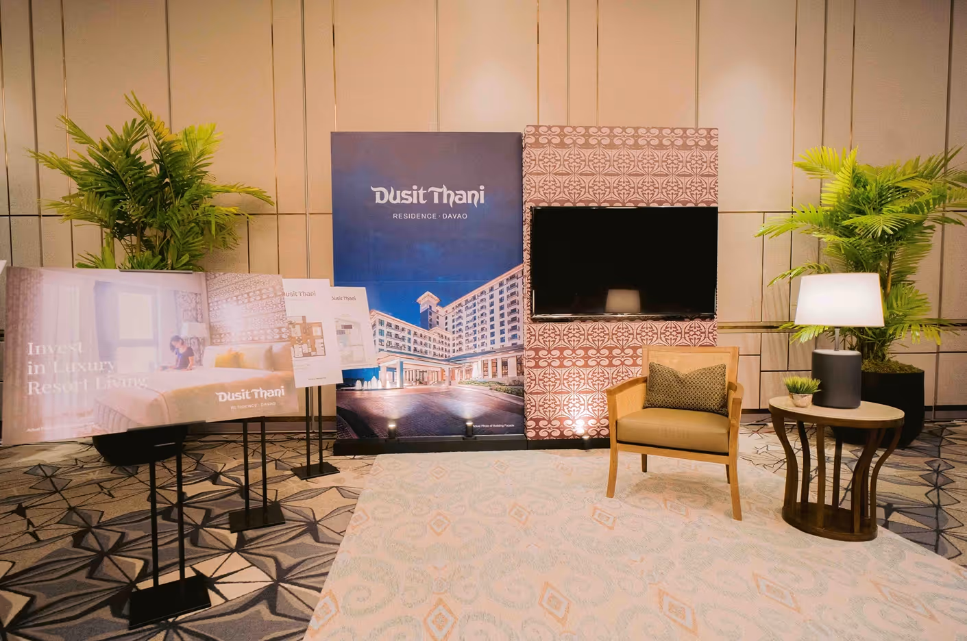 an exhibit area with chairs and a tv