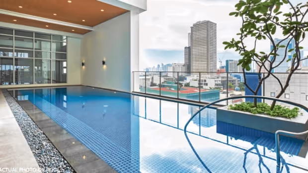 The Suites offer an indoor swimming pool with a view of the city.