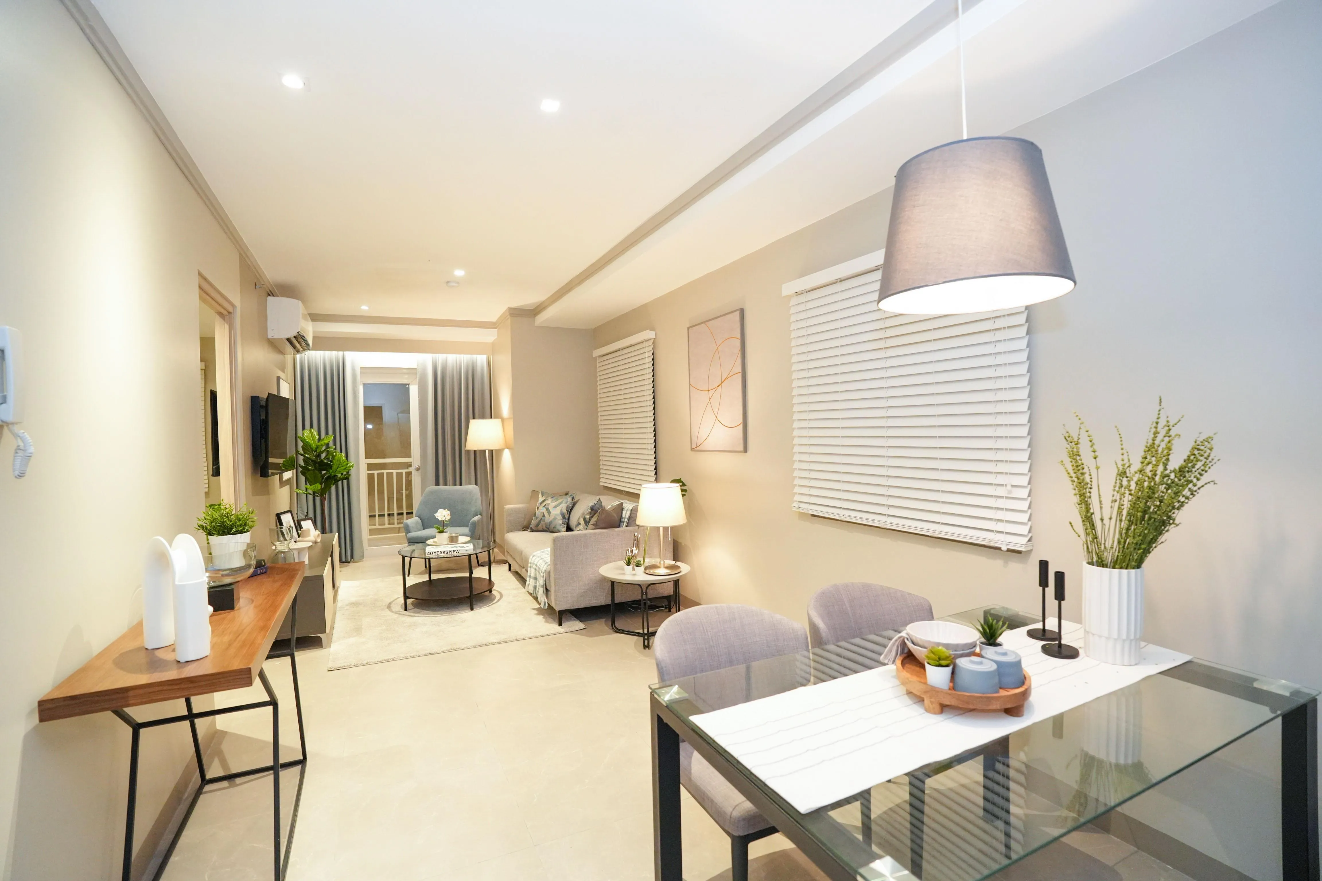 Modern apartment living and dining area with neutral tones