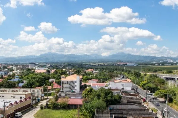 Aerial view of suburban town with mountains in the background