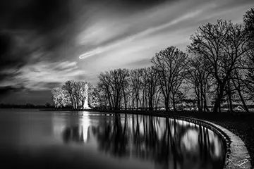 Presque Isle, Erie, PA. Perry Monument in moonlight. Moon is peaking through a fast moving clouds.