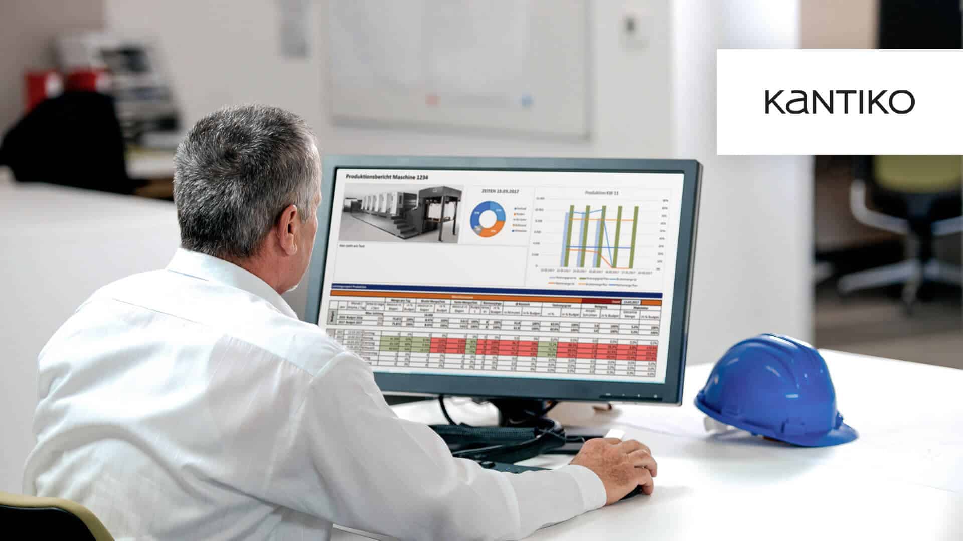 Digitales Produktionsdashboard mit Diagrammen vor Fabrikhintergrund