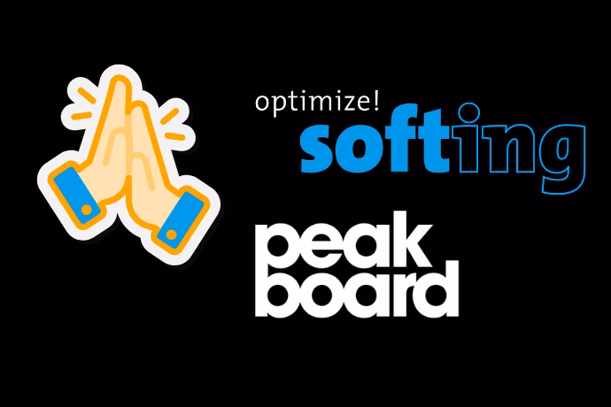 Busy Hannover Messe exhibition stand with staff engaging visitors and industrial product displays