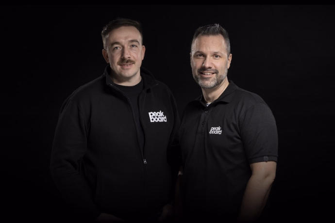 Group of smiling colleagues posed together for a team portrait