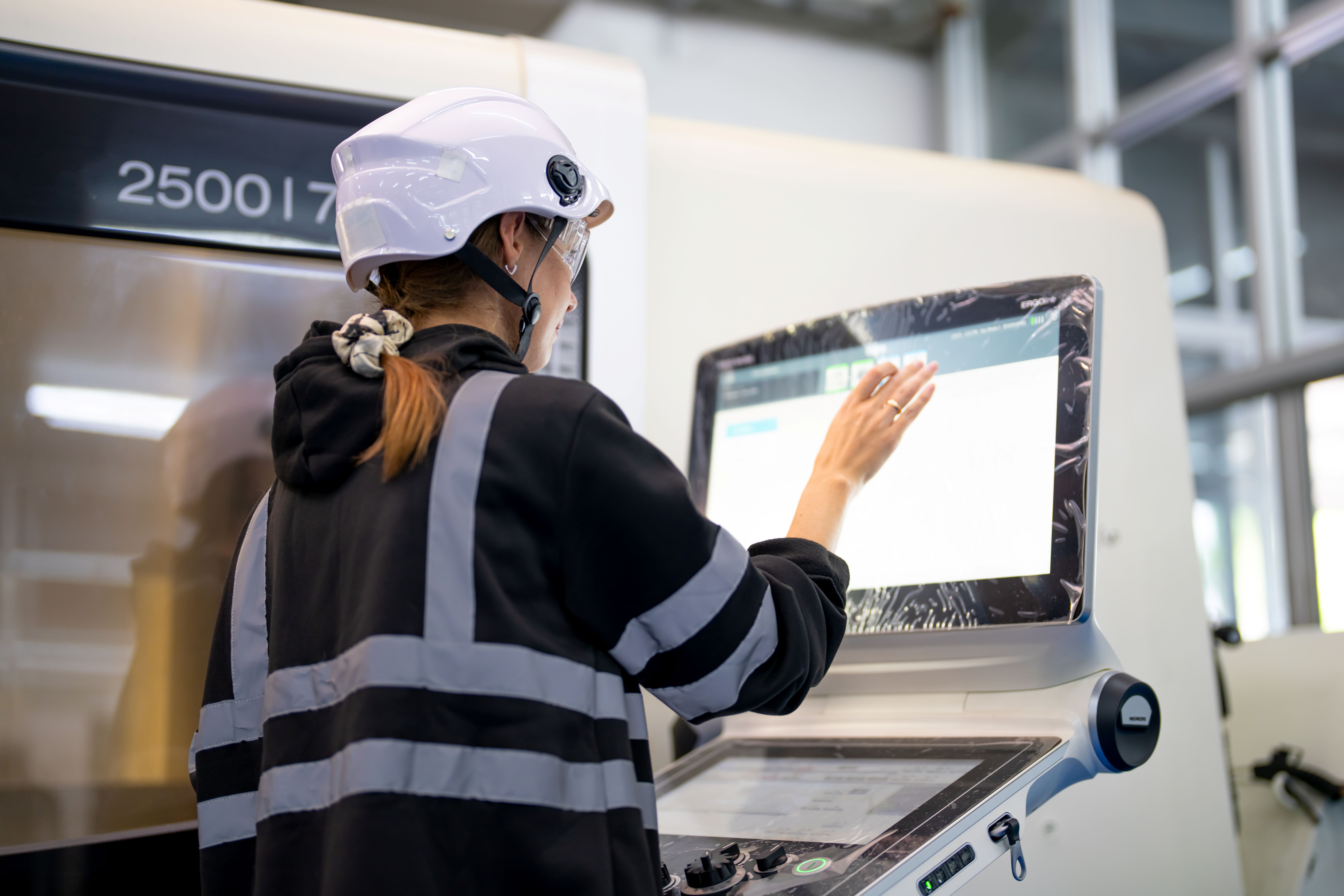 worker-using-touchscreen-in-manufacturing-plant-CUI-Towers Fractional Marketing The recent CMMC pause serves as a broader opportunity for MSPs to serve as a trusted technology advisor to defense contractors