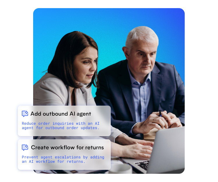 A man and woman in business attire looking at a laptop, discussing AI agents and workflow for returns.