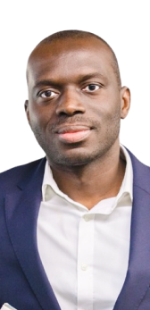 Portrait of a man wearing a navy blazer and white shirt with a calm expression.