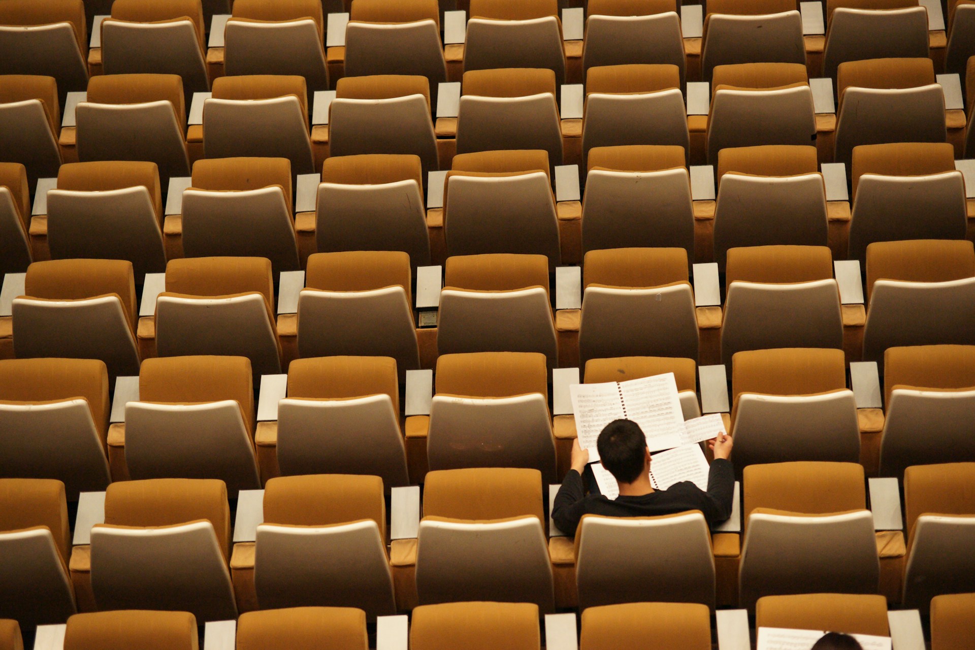 student in auditorium