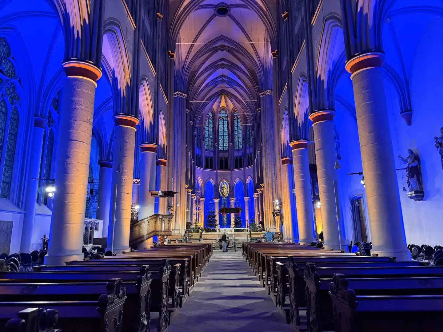 Altenberg Cathedral illuminated in blue and amber, central view, by photon