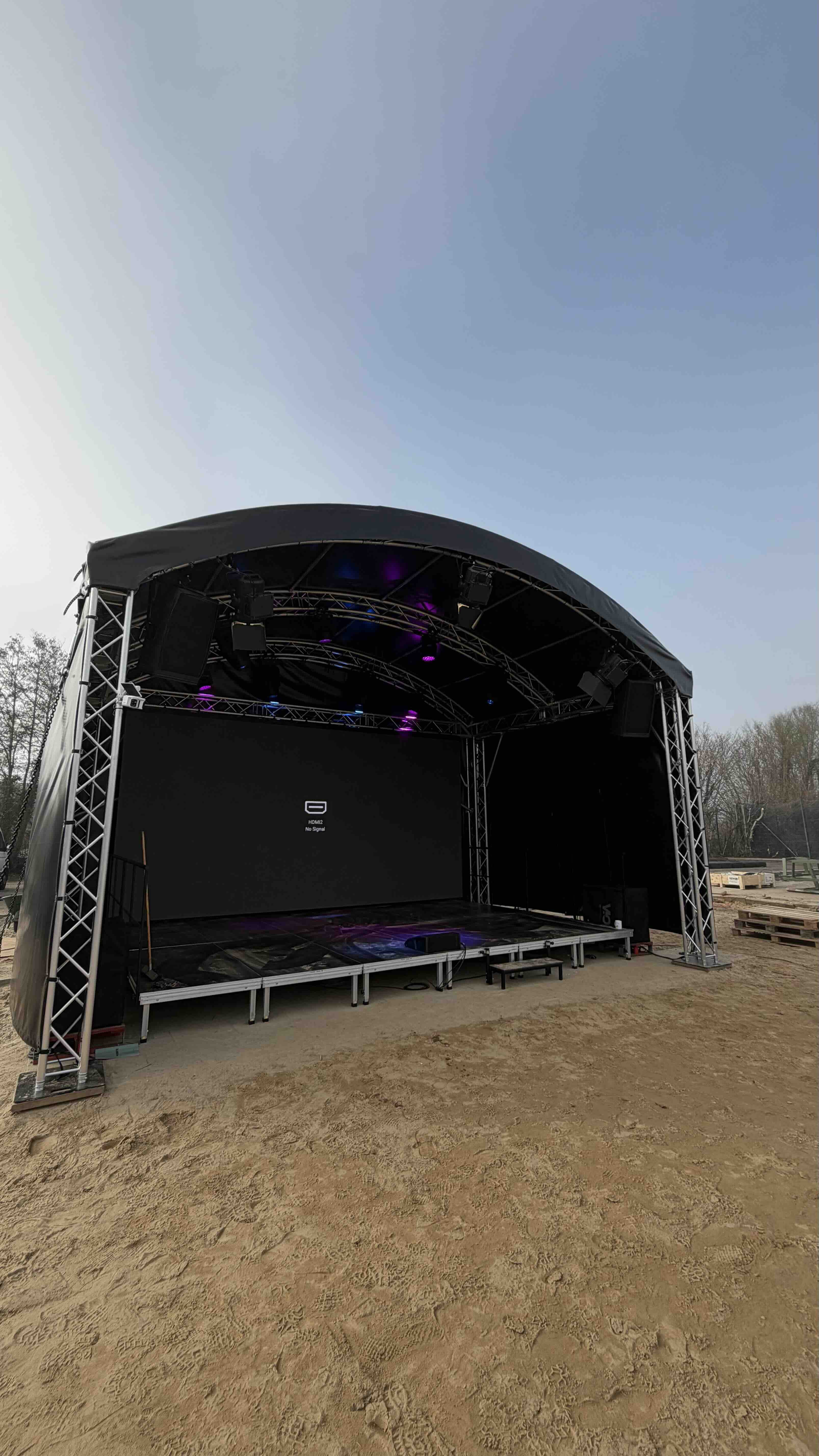 Stage with LED wall and lighting at the Waabs campsite by photon