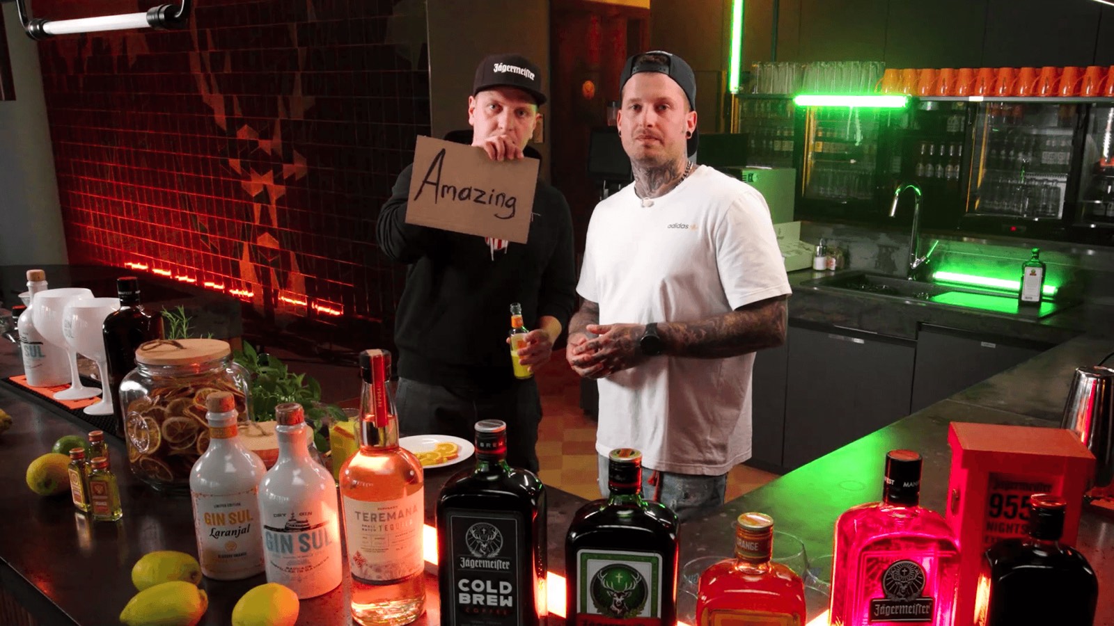 Jägermeister Townhall Show 2024 – hosts in the bar set with red and green lighting