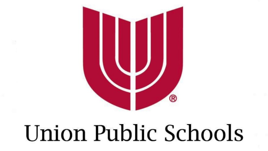 Union Public Schools logo with stylized red U shape above black text on white background.