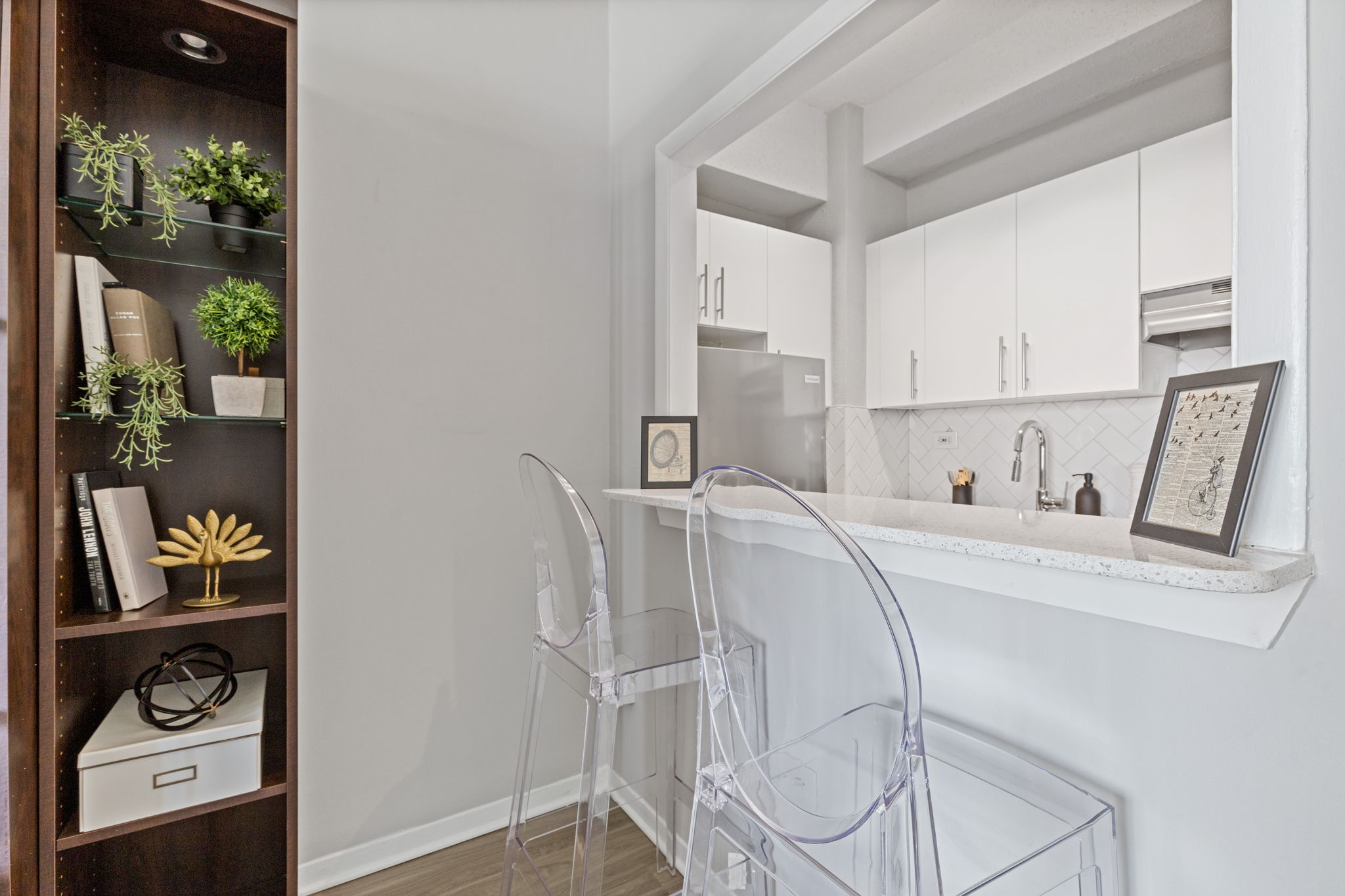 dining area with clear acrylic stools 