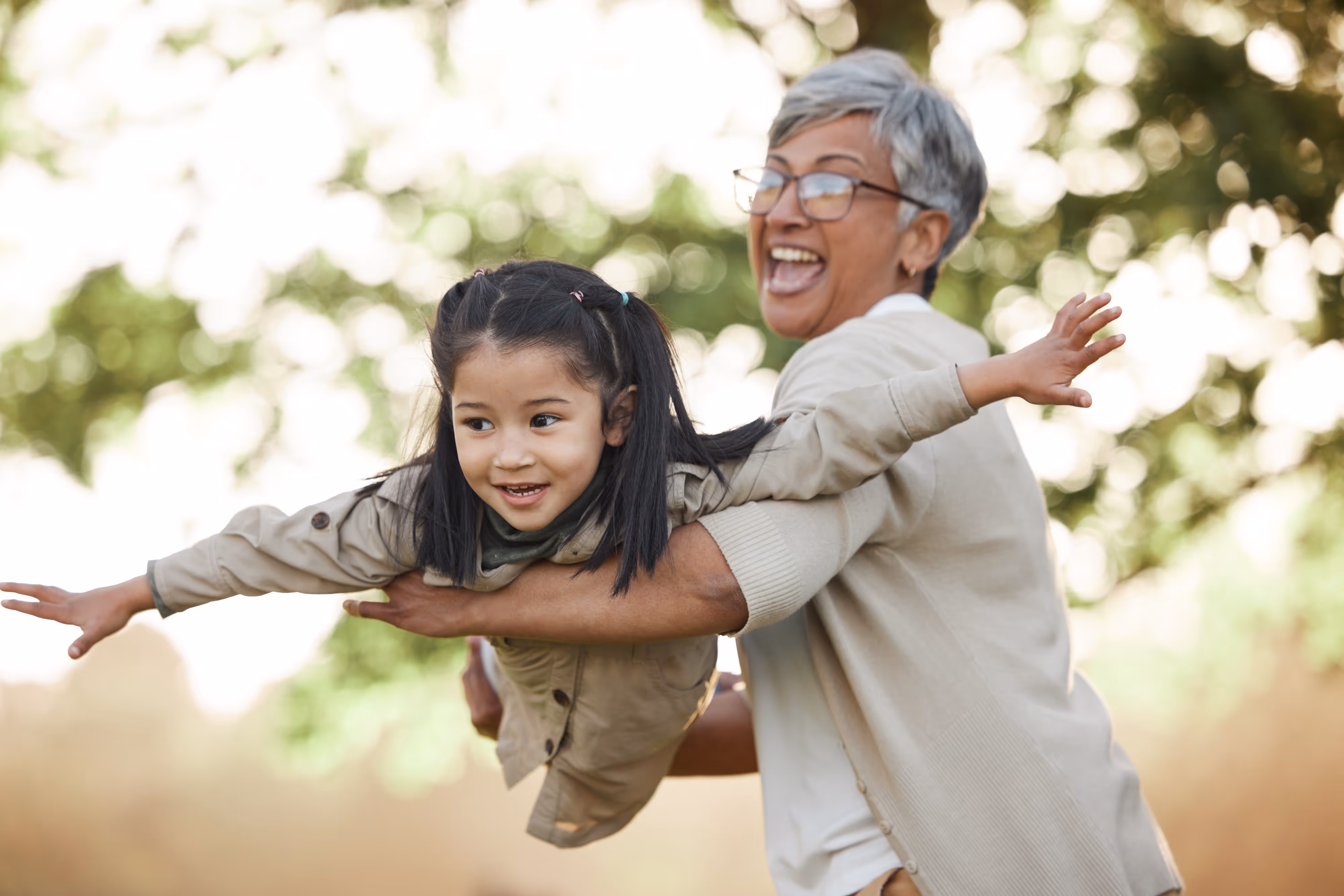 Grandmother and Granddaughter Playing Stock Photo